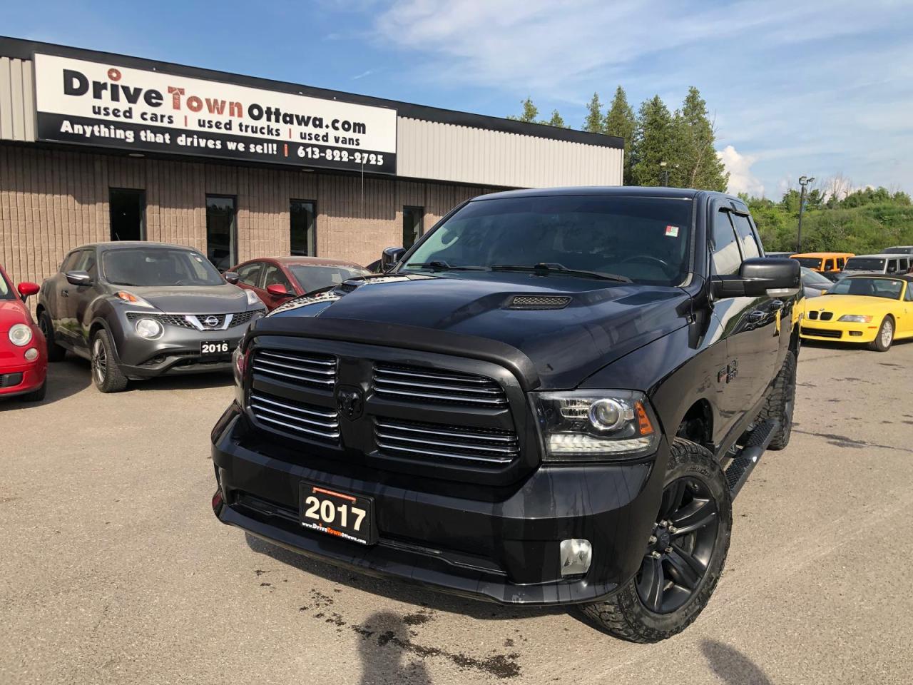 2017 RAM 1500 4WD QUAD CAB 140.5" SPORT